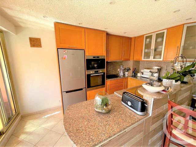Afficher la photo en grand Appartement F3 à vendre - 3 pièces - 60.0 m2 - ROQUEBRUNE CAP MARTIN - 06 - PROVENCE-ALPES-COTE-D-AZUR - Century 21 Agence Molière