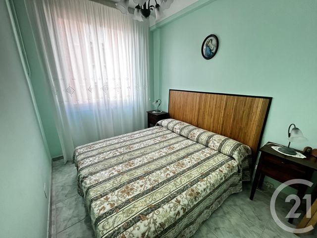 Afficher la photo en grand Appartement F3 à vendre - 3 pièces - 52.64 m2 - ROQUEBRUNE CAP MARTIN - 06 - PROVENCE-ALPES-COTE-D-AZUR - Century 21 Agence Molière